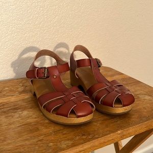 Brown lifted sandals